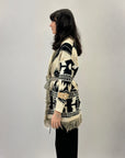Cardigan con frange e cintura
