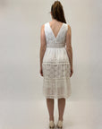 Abito in pizzo con scollo V e balze