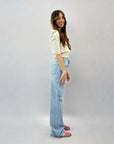 Jeans dritto con strappi