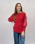 Maglione ampio con perle e strass