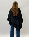Poncho morbido peluche