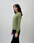 Pullover tinta unita con bottoni laterali