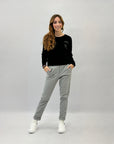 Pantaloni spigati con vita elasticizzata