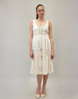 Abito in pizzo con scollo V e balze