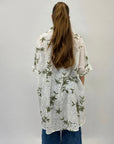 Camicia in pizzo con dettaglio fiori