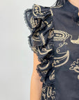 Blusa in cotone con maniche a volant con ricami