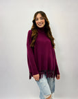 Maglione dolcevita comodo con frange