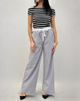 Pantaloni gamba larga con elastico