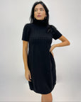 Abito in maglia a trecce con collo alto