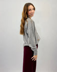 Pullover fiocchietti ricamati