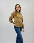 Maglione lupetto con dettagli frange