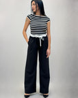 Pantaloni gamba larga con elastico