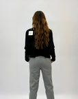 Pantaloni spigati con vita elasticizzata