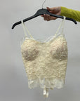 Top in pizzo con coppe preformate