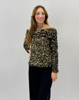 Maglietta con paillettes e scollo a bardot