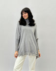 Maglione dolcevita ampio con frange