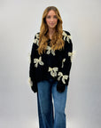 Maglione con fiocchi