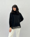 Maglione ampio dolcevita con frange