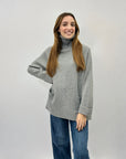 Maglione dolcevita ampio con tasche