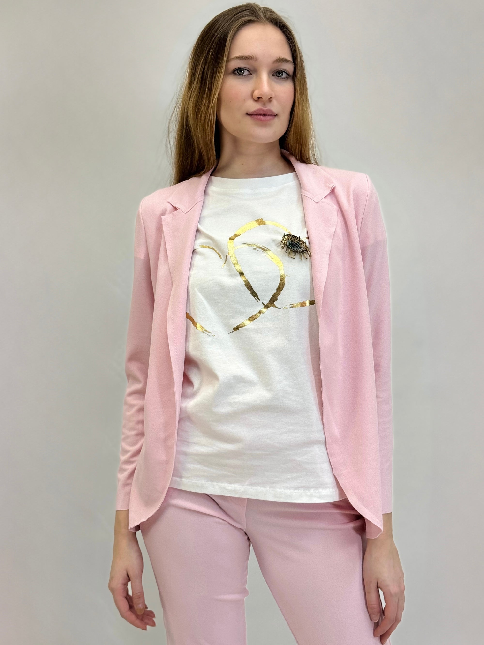 Pantaloni a sigaretta con svolta