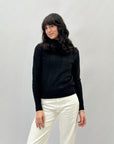 Maglione lupetto con intrecci