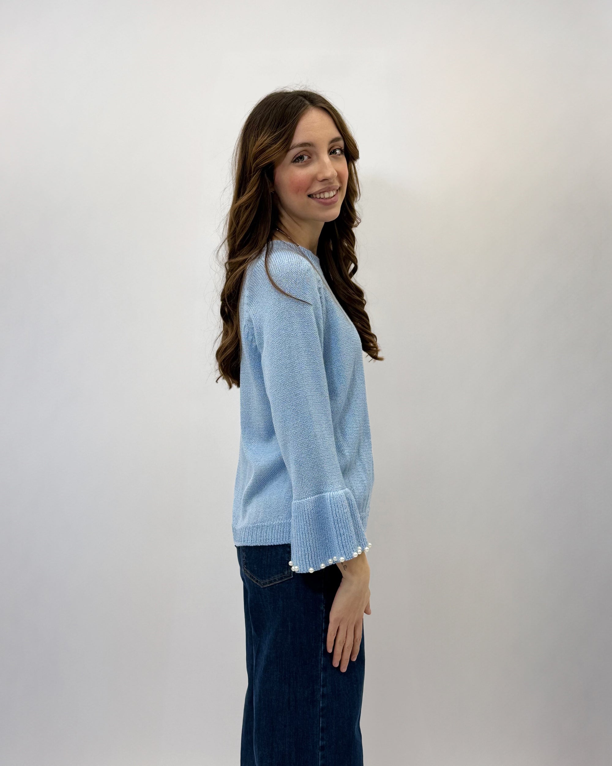 Maglia con perle sulle maniche