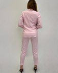 Pantaloni a sigaretta con svolta