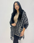 Poncho con pelliccia sintetica