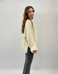 Maglione con bottoni over
