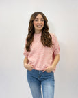 Maglia morbida con gioiello