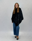 Poncho morbido peluche