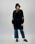Cappotto morbido con dettaglio cuore