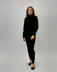 Completo maglia dolcevita e pantaloni