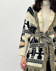 Cardigan con frange e cintura
