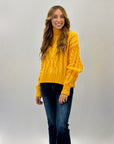 Maglione lupetto pesante con intrecci