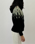 Maglione con cappuccio stampa jacquard