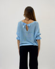 Maglia con manica volant e fiocco