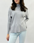 Pullover comodo lupetto con dettaglio