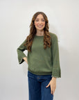 Maglia con perle sulle maniche