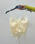 Top in pizzo con coppe preformate