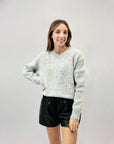 Maglione morbido con decorazioni