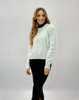Maglione intrecci dettaglio metallizzato