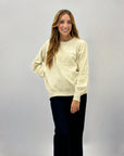 Maglione morbido con dettaglio