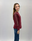 Maglione ampio con perle e strass