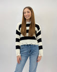Pullover a righe con dettagli