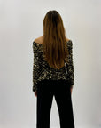 Maglietta con paillettes e scollo a bardot