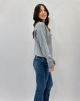 Maglione scritta wonderful in paillettes