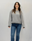Pullover morbido con dettagli
