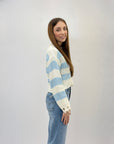 Pullover a righe con dettagli