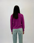Maglione dolcevita con tre intrecci